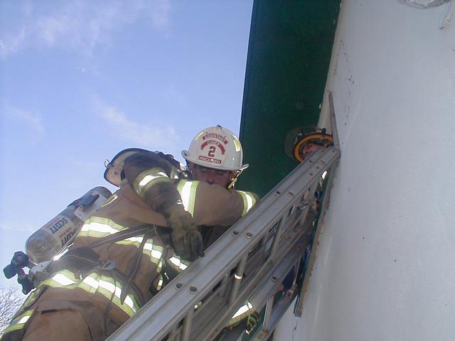 DEPUTY CHIEF DAVID WAGONER BEING REMOVED FROM 2nd STORY WINDOW